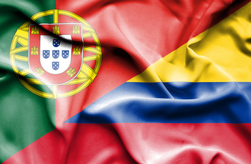 Waving flag of Columbia and Portugal