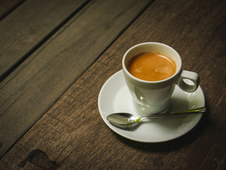 cup of coffee latte on the wood texture