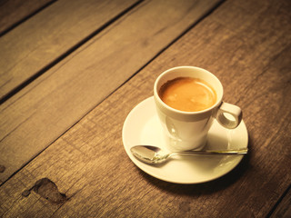 cup of coffee latte on the wood texture
