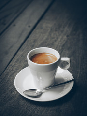 cup of coffee latte on the wood texture
