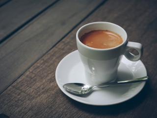 cup of coffee latte on the wood texture