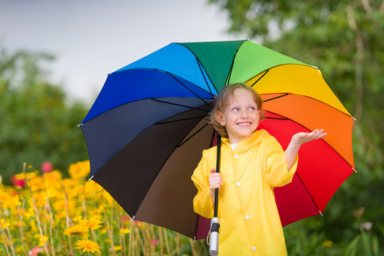 kid with umbrella