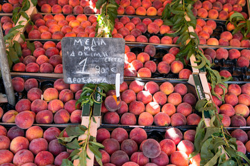 Fresh ripe peaces on the farm market in Greece
