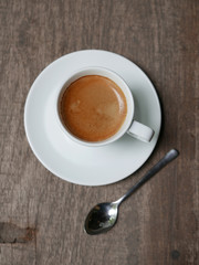 cup of coffee latte on the wood texture