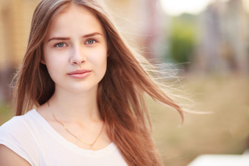 Obraz premium Closeup portrait of beautiful girl outdoors