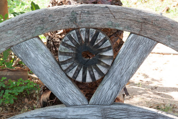 Old wooden chair backrest in garden