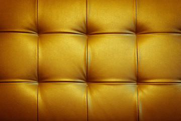 Genuine leather upholstery background for a luxury decoration in Yellow tones