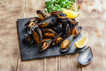 mussels steamed oysters with lemon and herbs