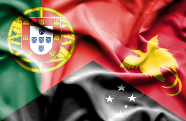 Waving flag of Papua New Guinea and Portugal