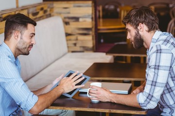  Business team looking at tablet