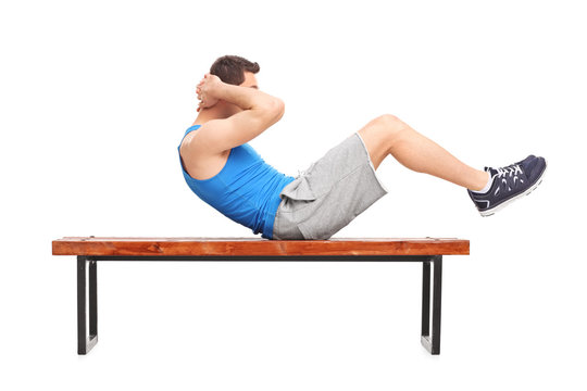 Young Male Athlete Doing Stomach Crunches