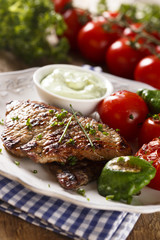 Grilled beef steak with vegetables