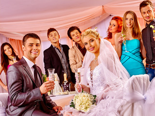 Group people drinking champagne at wedding.