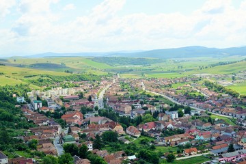 Fototapeta na wymiar Panorama Rupea city in Transylvania, Romania . View from Rupea fortress.