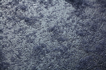 snow background on glass snowflake