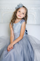 Beautiful girl in gray dress and pointe shoes  © jutaphoto