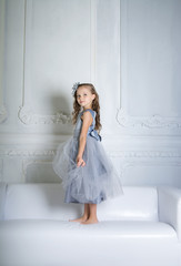 Beautiful girl in gray dress and pointe shoes  © jutaphoto