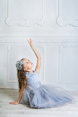 Beautiful girl in gray dress and pointe shoes  © jutaphoto