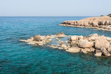 Fototapeta premium Crystal clear waters and sandstone rocks of the Mediterranean Se