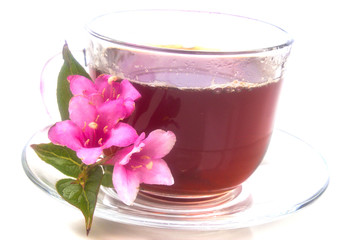 saturated bright fragrant tea with pink flowers