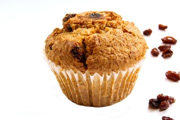 Bran muffin isolated on white