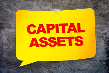 "Capital assets" in the yellow banner textural background. Desig