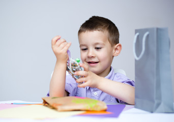 Boy holding present box