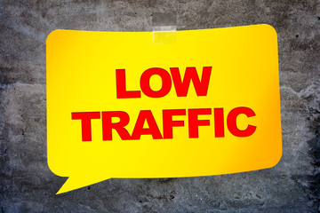 "Low traffic" in the yellow banner textural background. Design t