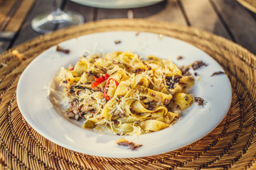 Pasta on white plate.