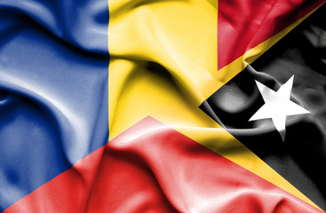 Fototapeta premium Waving flag of East Timor and Romania