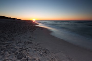 Beautiful Baltic sea beach at sunset