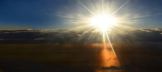 Sun-shining sky above storm, clouds. Panorama. /
The beautiful sun shining sky, sunrise above...
