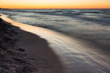 Beautiful Baltic sea beach at sunset