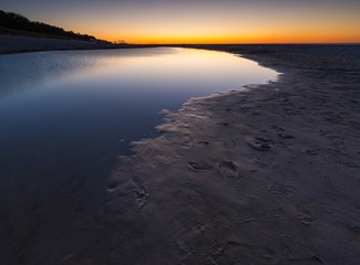 Beautiful Baltic sea beach at sunset