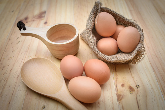 eggs on plate wood background