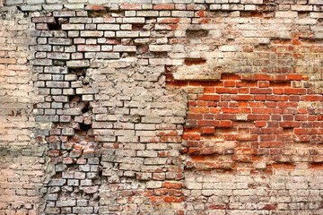 Broken Old Bricklaying From Red White Bricks And Damaged Plaster