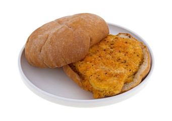 Breaded chicken sandwich on a dish