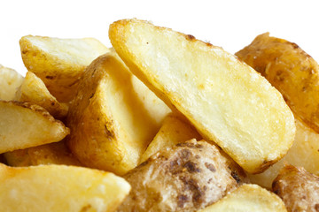 Detail of fried american potato wedges on white.