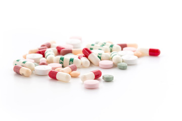 diferent Tablets pills capsule heap mix therapy drugs doctor flu