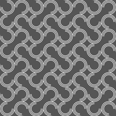 Dark gray ornament with offset c shapes
