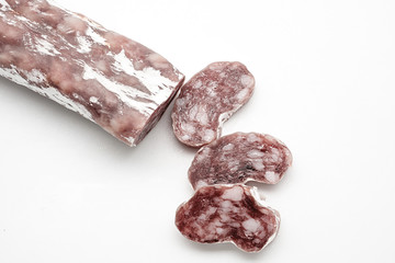 Spanish salami fuet on white background
