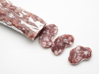 Spanish salami fuet on white background