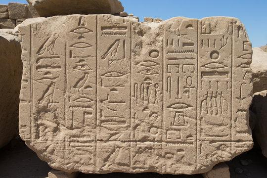 old egypt hieroglyphs carved on the stone