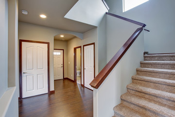 Elegant hallway with stairs.