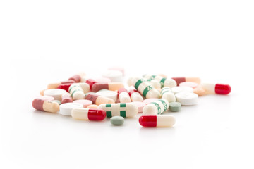 Obraz na płótnie Canvas diferent Tablets pills capsule heap mix therapy drugs doctor flu