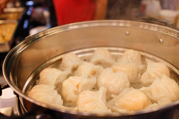 shrimp dumplings in a steamer