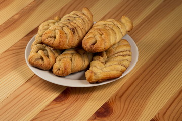Fresh pastries on wooden table
