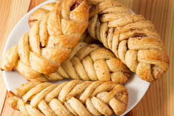 Fresh pastries on wooden table