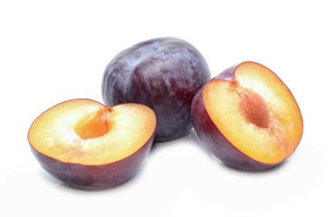 plums isolated on white