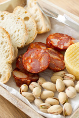 chourico with cheese, nuts and bread